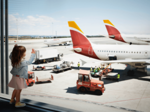 Child watches Iberia planes