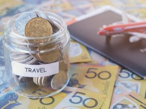 Australian money in TRAVEL jar with passport