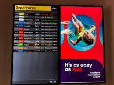 Aberdeen Airport departure board showing gate information