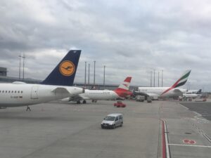 Lufthansa, Austrian and Emirates planes at Hamburg Airport.