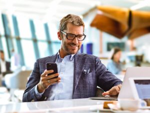 Businessman in Virgin Australia Lounge