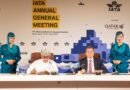 Oman Air CEO Eng Abdulaziz Al Raisi (seated, left) and oneworld CEO Rob Gurney (seated, right) sign the agreement for Oman Air to join oneworld in Doha at the IATA Annual General Meeting