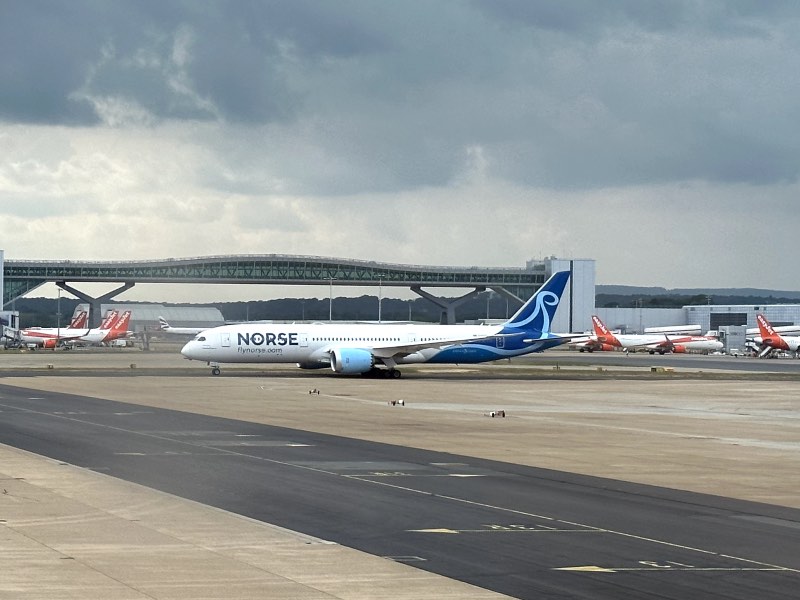Norse Atlantic 787 at London Gatwick Airport with Easyjet planes in background