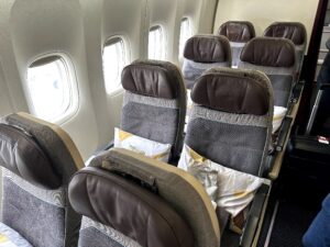 There are several pairs of two seats at the back of the Etihad 777