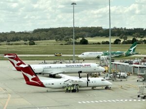 QantasLink Airbus A220, Boeing 717 and Bombardier Dash 8 at Melbourne Airport