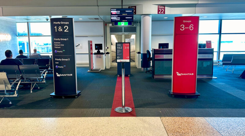 Qantas boarding group signage at a gate at Brisbane Airport