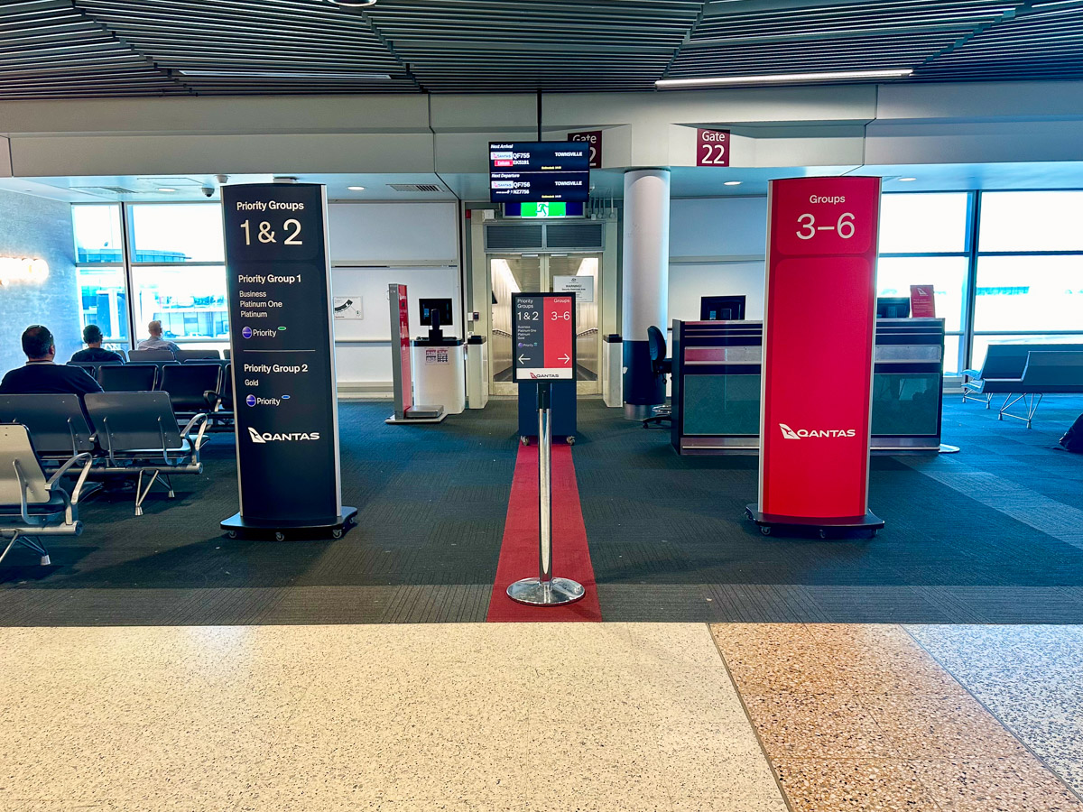 Qantas boarding group signage at a gate at Brisbane Airport