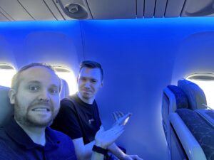 Chris and Matt once ended up sitting at a windowless window seat after a seat selection mishap