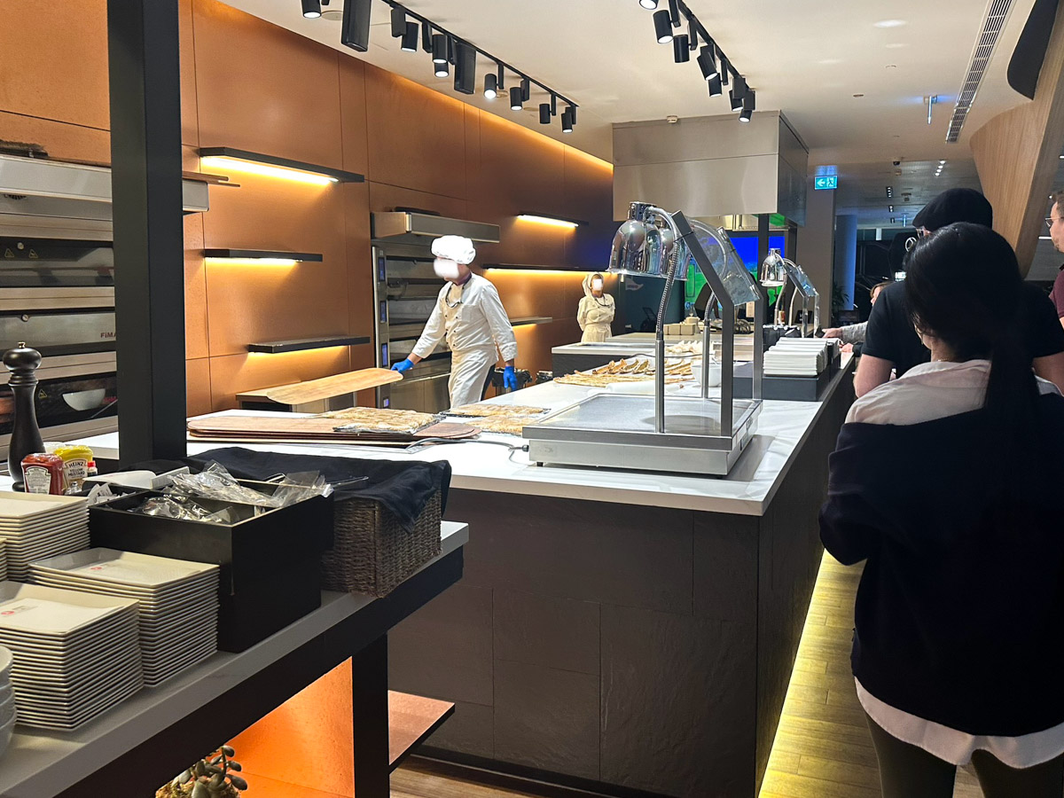 The chef was freshly preparing some delicious pide in the Turkish Airlines lounge at Istanbul