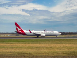 A Qantas Boeing 737-800 takes off at Melbourne Airport