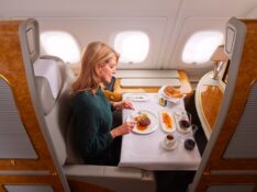 Emirates First Class dining with paired wine and bread basket
