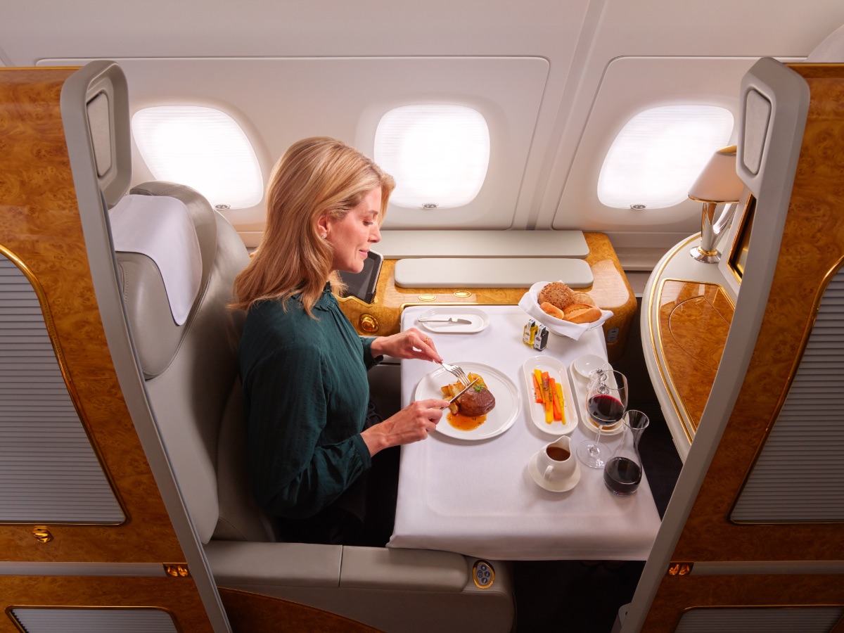 Emirates First Class dining with paired wine and bread basket