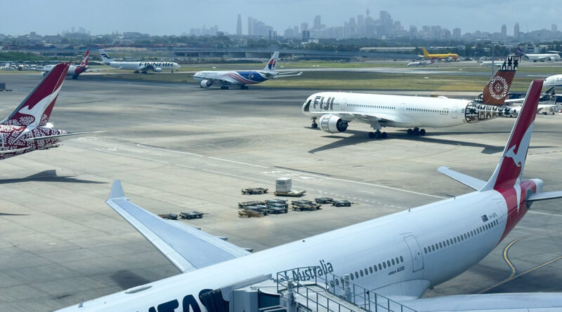 Qantas, Fiji Airways, Malaysia Airlines and Finnair Airbus jets at Sydney Airport