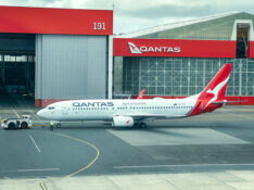 A Qantas Boeing 737-800 prepares to depart Sydney Airport