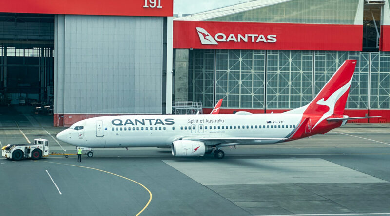 A Qantas Boeing 737-800 prepares to depart Sydney Airport