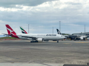 Qantas, Emirates and Air New Zealand planes at Auckland Airport