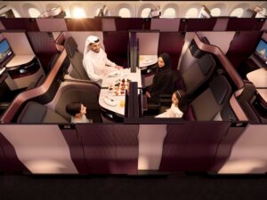 A family in Qatar Airways Qsuites