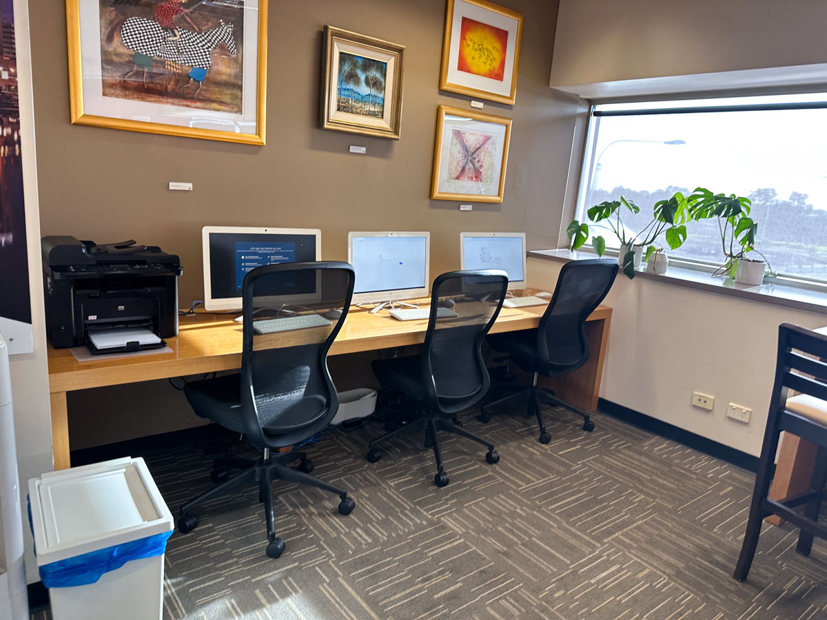 Computers in the work station in the Rex Adelaide Lounge