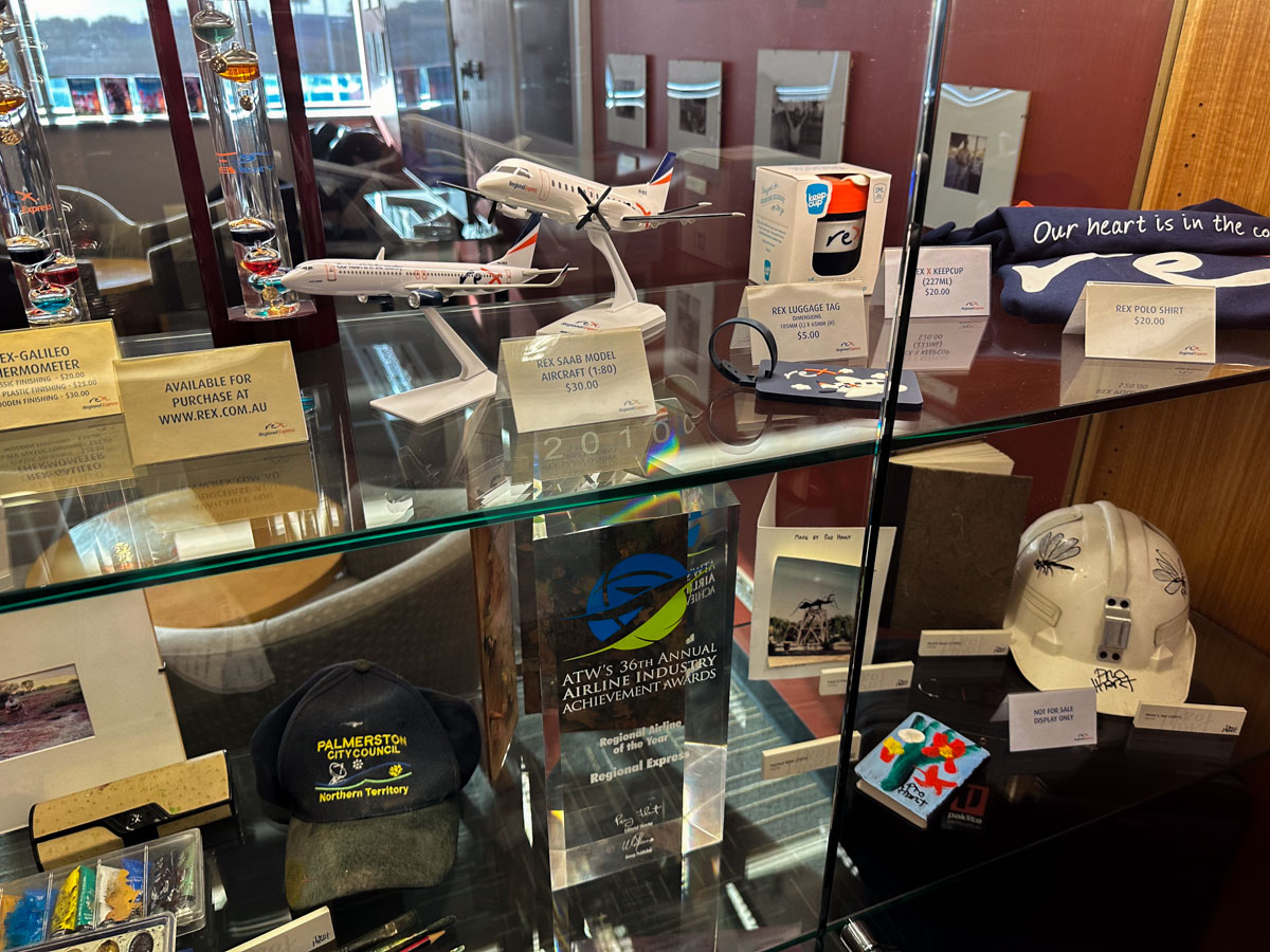 Memorabilia and souvenirs for sale, including model planes, in the Rex Adelaide Lounge