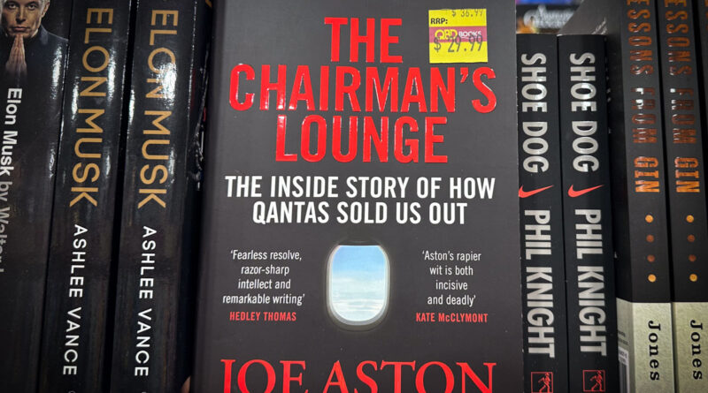 Joe Aston's book, "The Chairman's Lounge", on the shelf at a book store