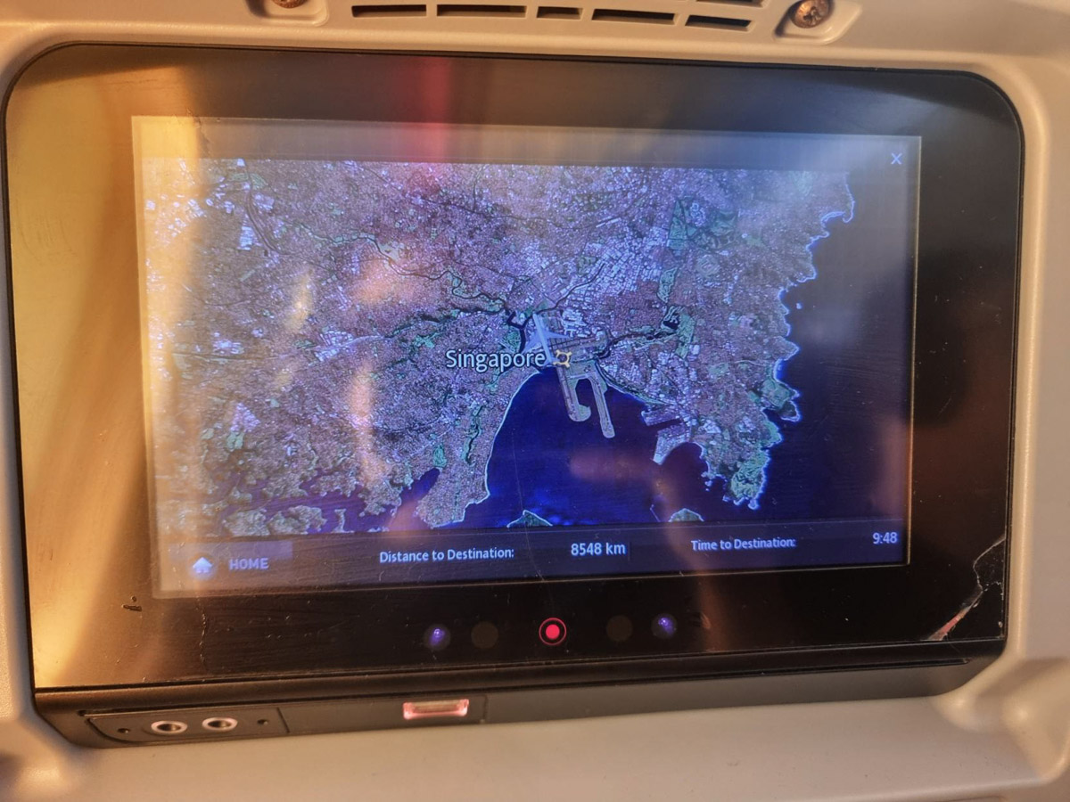 Jetstar 787 Economy Class entertainment screen, with flight map displaying Singapore.