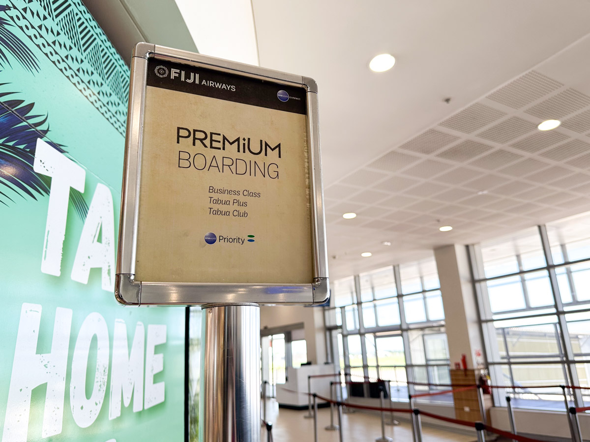 Fiji Airways premium boarding sign with Oneworld Connect branding