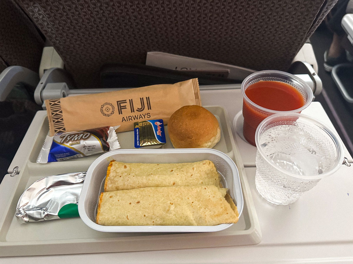 Tandoori aloo gobi wrap with potato and English cabbage served in Fiji Airways economy class