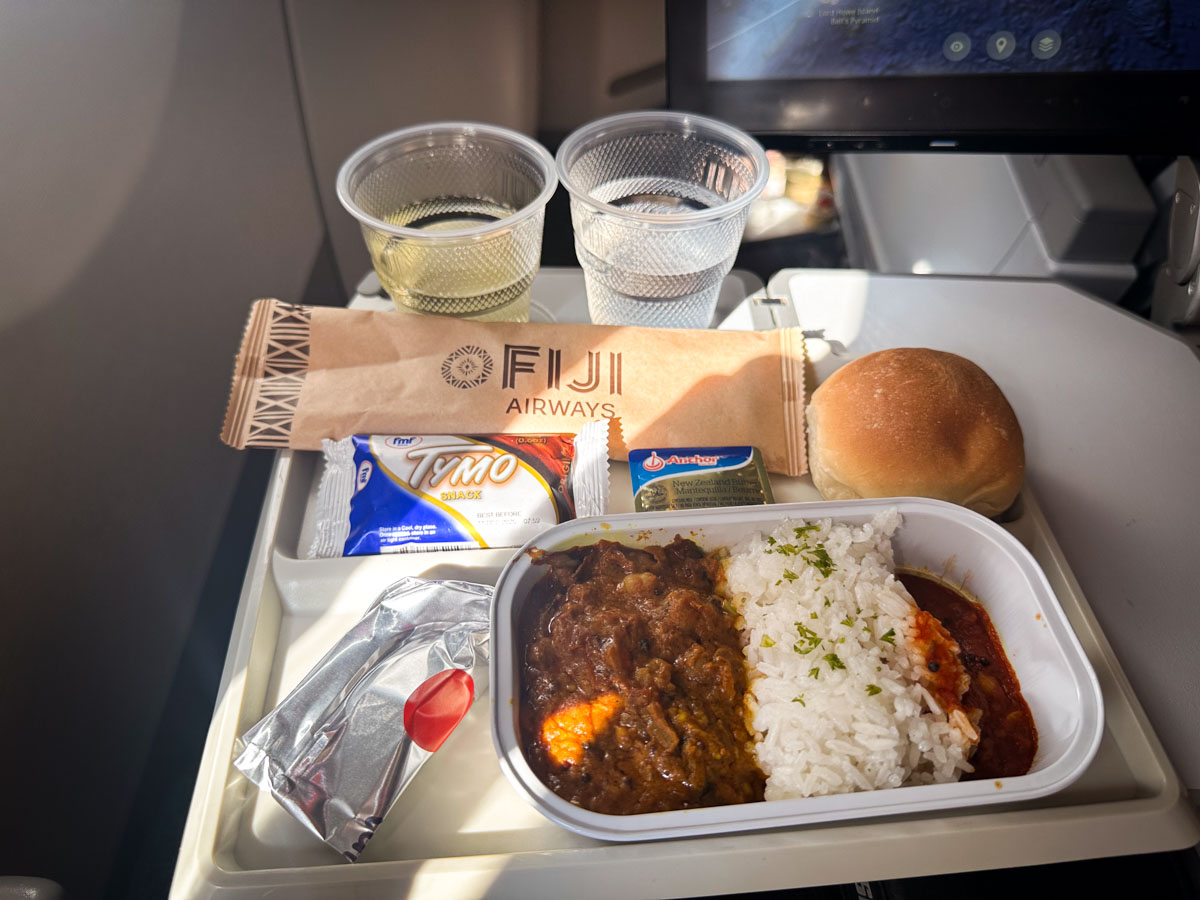 Chickpea curry with rice and tomato chutney, the vegetarian meal option in Fiji Airways economy class