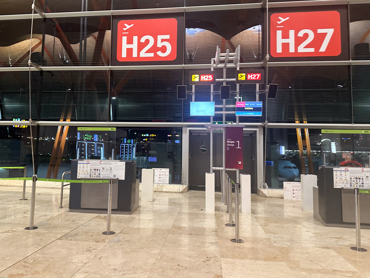 Madrid airport boarding gate for Iberia flight to Vienna