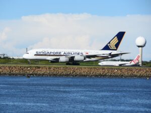 A Singapore Airlines A380 and Virgin Australia 737 at Sydney Airport