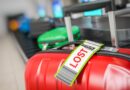 Suitcase with lost sticker on an airport baggage conveyor or baggage claim transporter Frankfurt