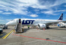 LOT Polish Airlines E195 at Warsaw Chopin Airport at a standoff bay