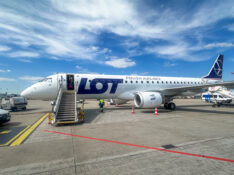 LOT Polish Airlines E195 at Warsaw Chopin Airport at a standoff bay