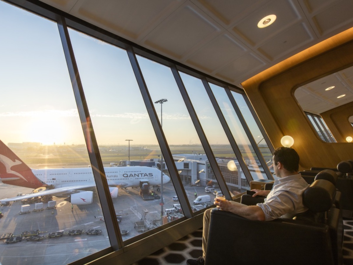 The Qantas Sydney First Lounge with an A380 at the gate