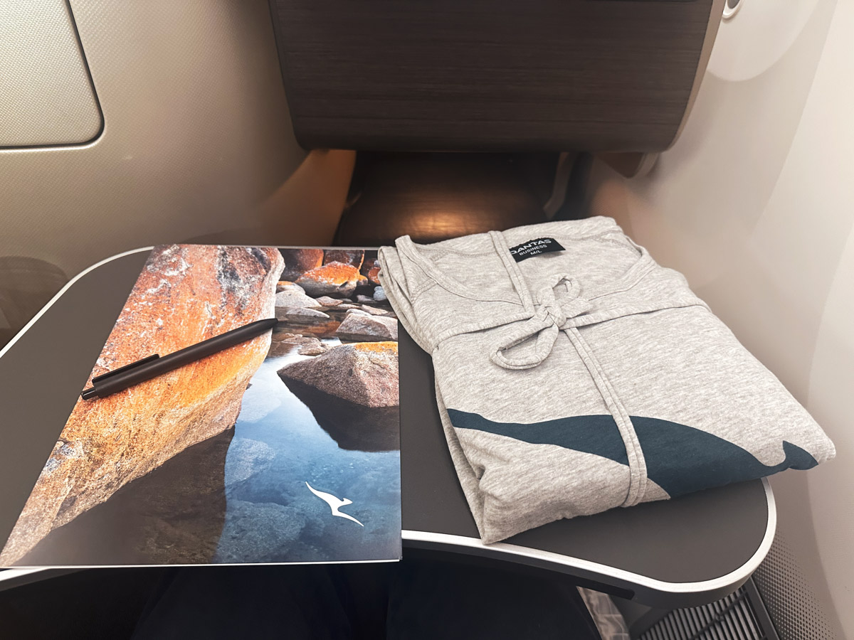Qantas business class pyjamas and a menu