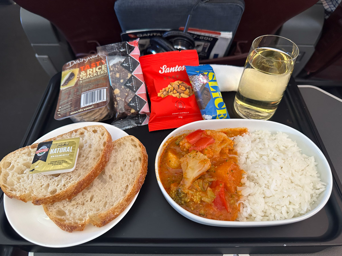 Vegetarian curry with a selection of on-demand snacks in Qantas Business Class