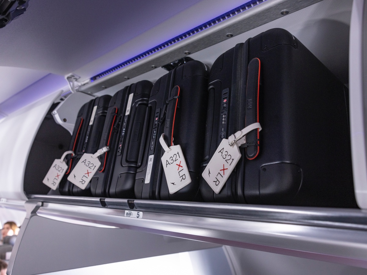 Carryon bags in the overhead locker on a Qantas A321XLR