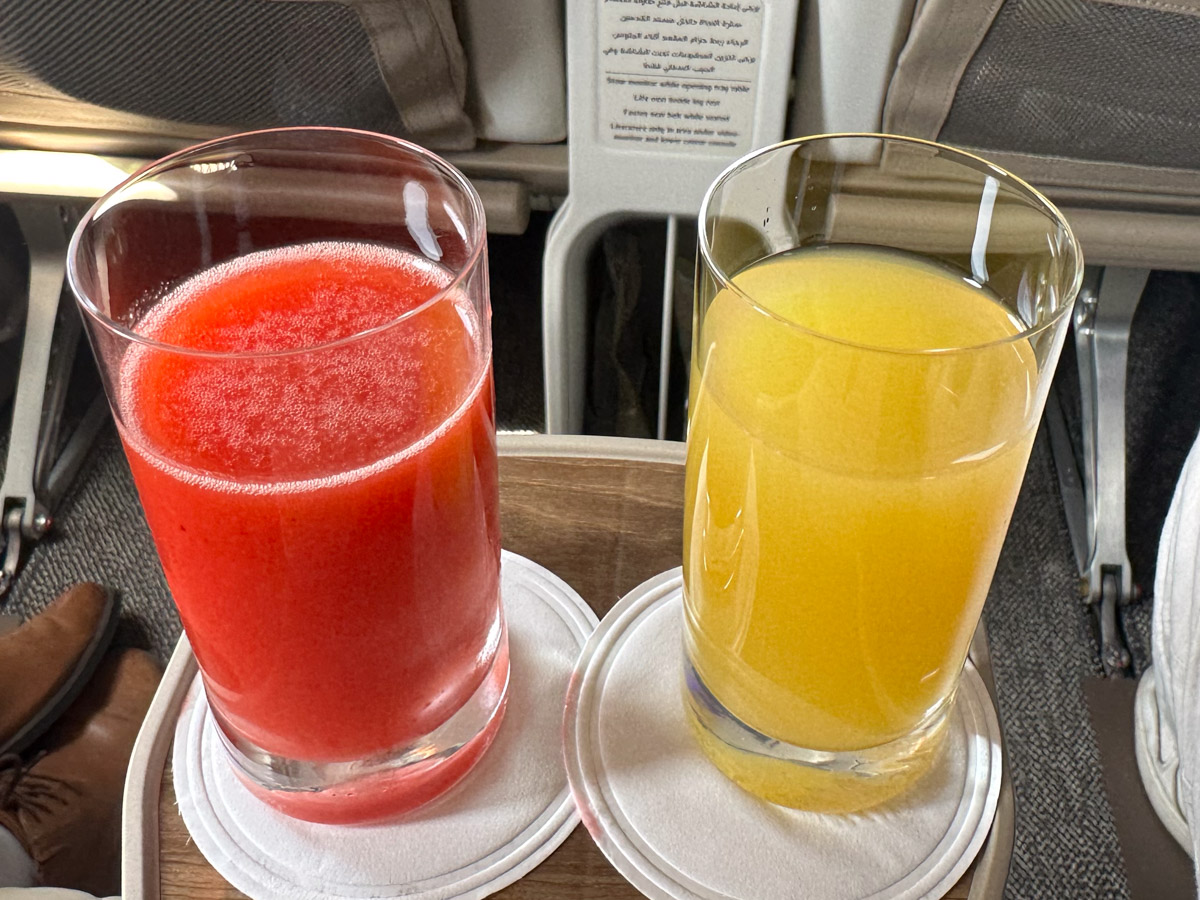 Emirates premium economy fruit juices served in glasses
