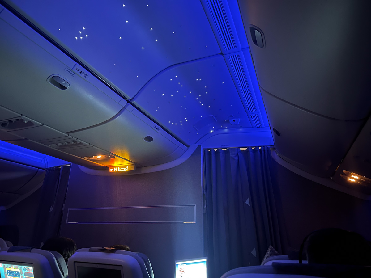 Night sky projected onto the ceiling of an Emirates 777 cabin