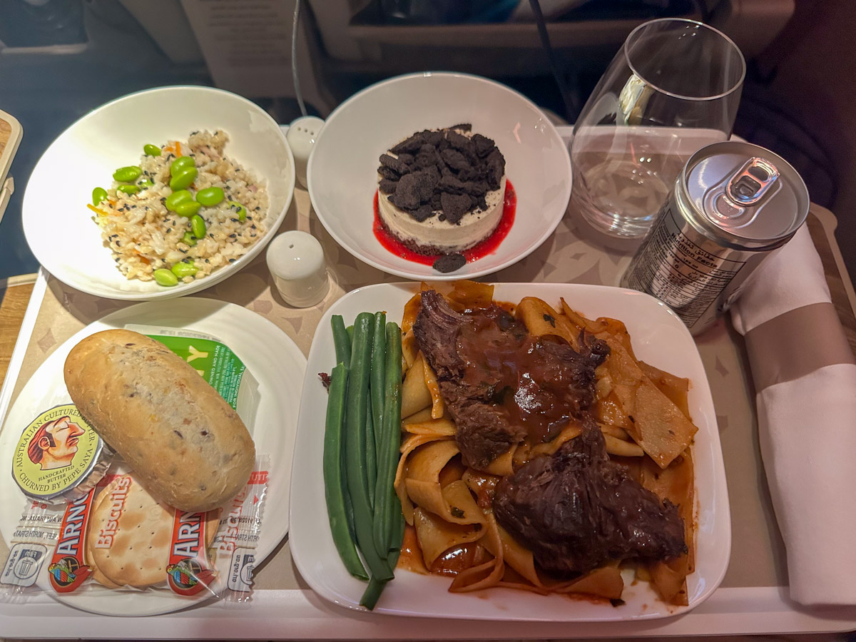Braised beef cheeks with pappardelle and green beans in Emirates premium economy