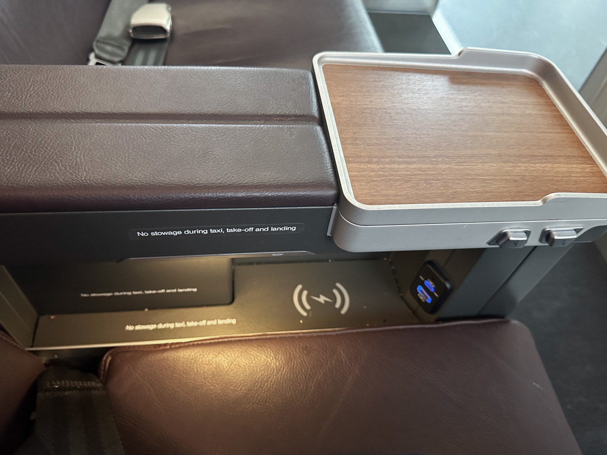 QantasLink A220 wireless phone charging in business class