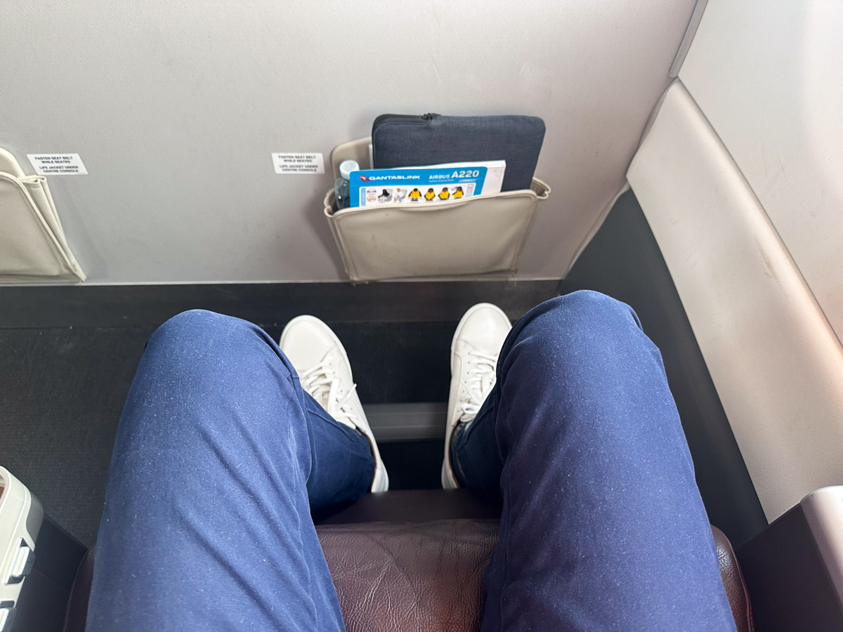 QantasLink A220 business class footrest in use
