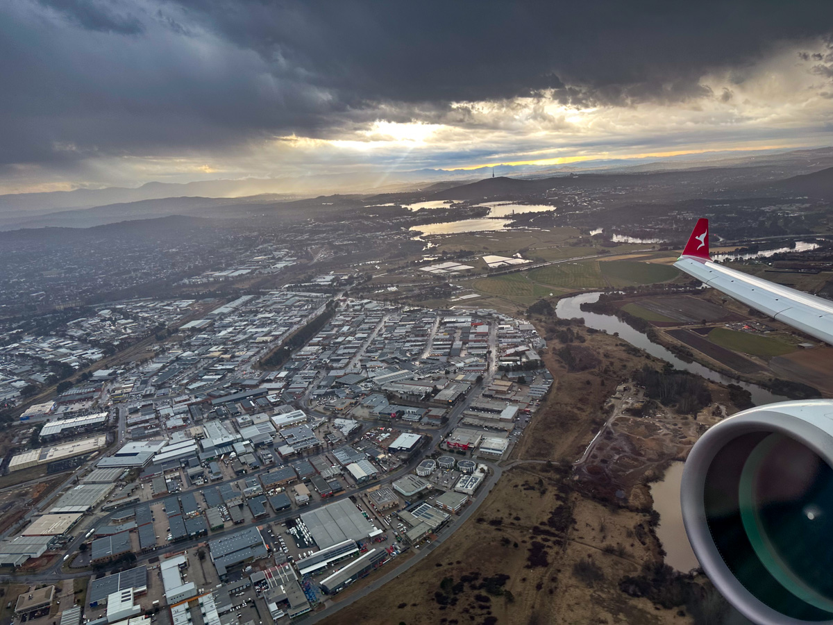 Taking off from Canberra Airport (CBR) on a stormy afternoon on a QantasLink A220