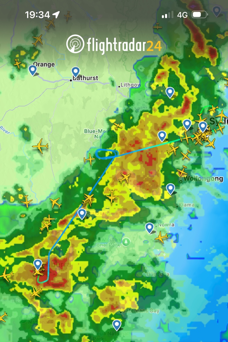 Flightradar24 screenshot of QF1450 flight path around bad weather