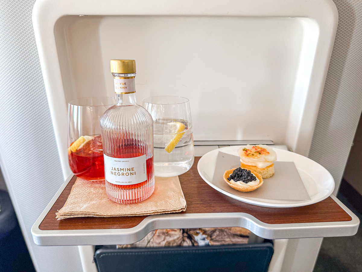 Caviar tartlet and confit of scallop in Qantas first class, with a Jasmine Negroni cocktail