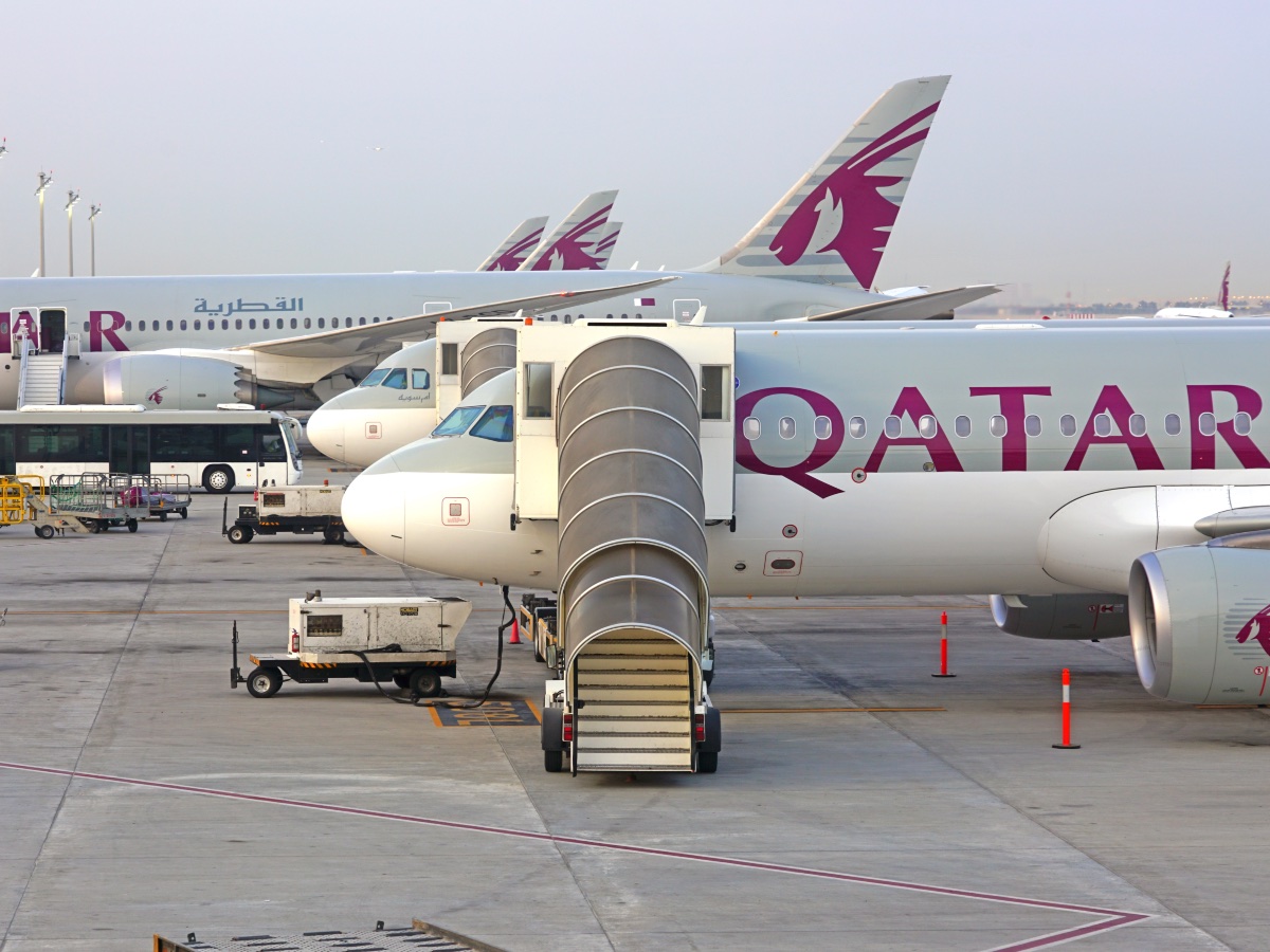 View of airplanes from Qatar Airways (QR) at the Hamad International Airport (DOH) in Doha, the hub for national carrier Qatar Airways.