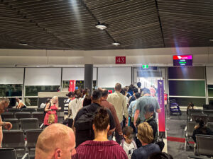 Boarding a Virgin Australia flight at a Brisbane Airport gate