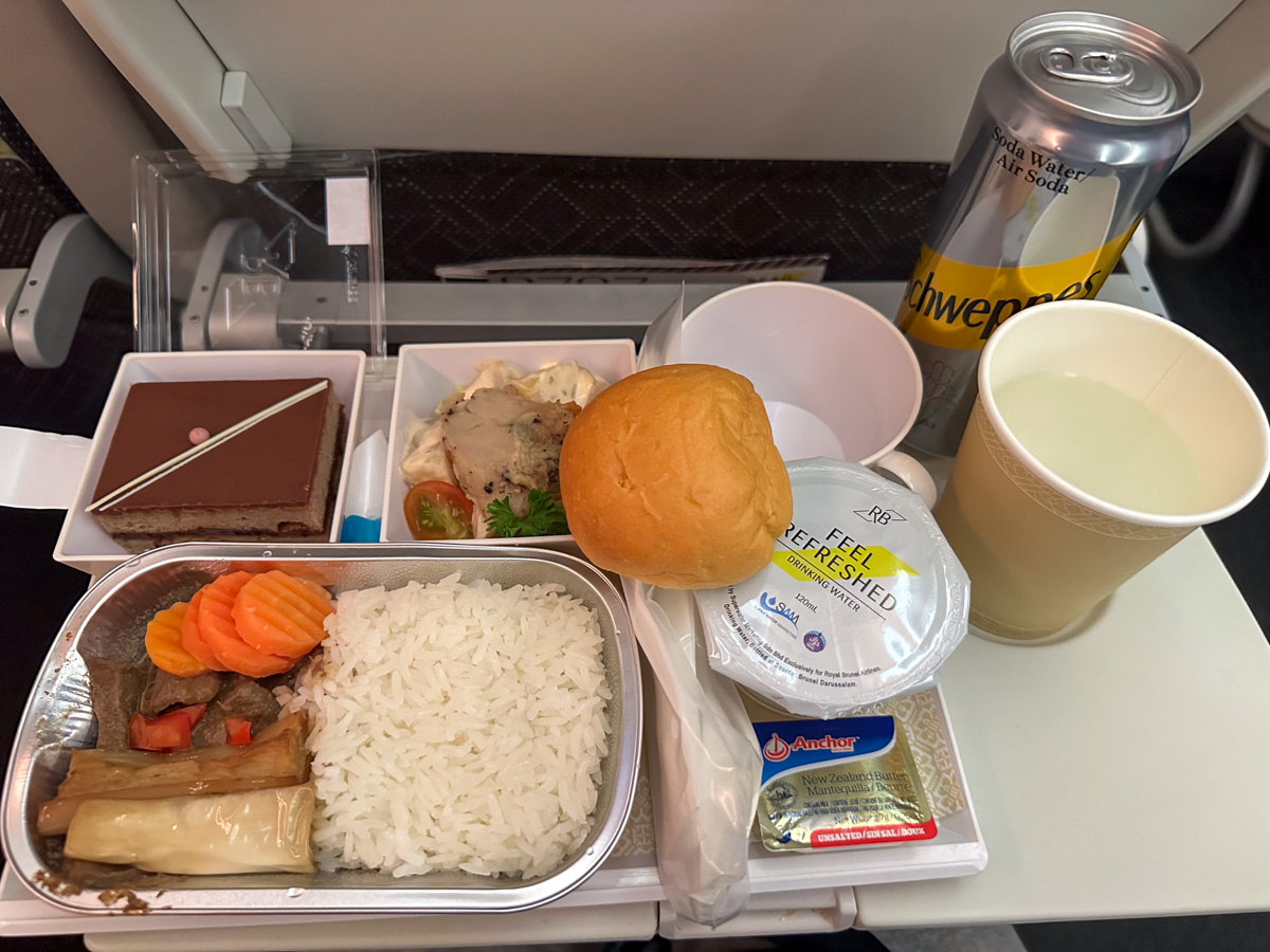 Royal Brunei Economy Class meal with Thai beef curry, potato salad and chocolate sponge cake