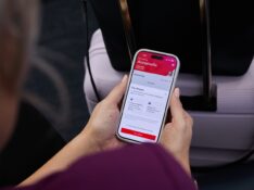 Person using Virgin Australia app to fly ahead
