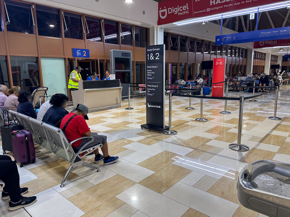 Qantas boarding group signage at APW airport